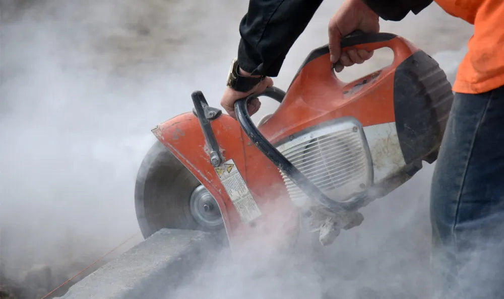 Construction image of a worker with dust particles